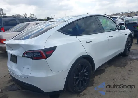 2022 Tesla Model Y из США, поврежденный, VIN 7SAYGDEE1NF386630